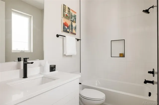 a view of roof deck with patio