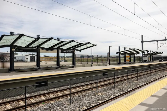 a view of a swimming pool and a yard