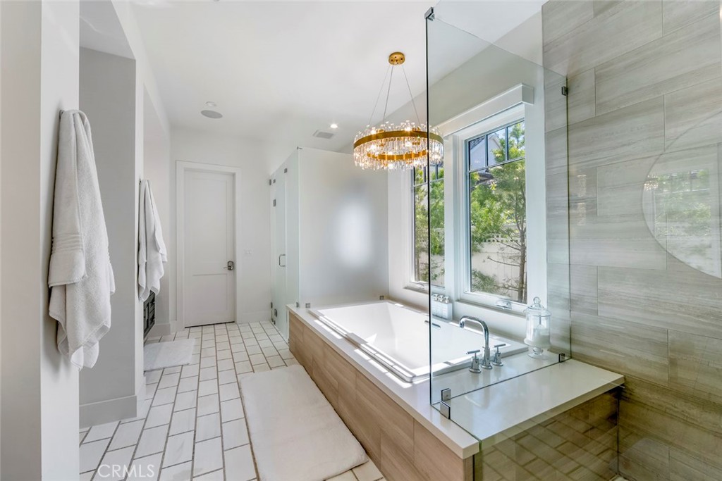 5 Rancho Elastico Road Rolling Hills Estates, CA 90274 - Photo 26 of 48 a bathroom with a tub and shower
