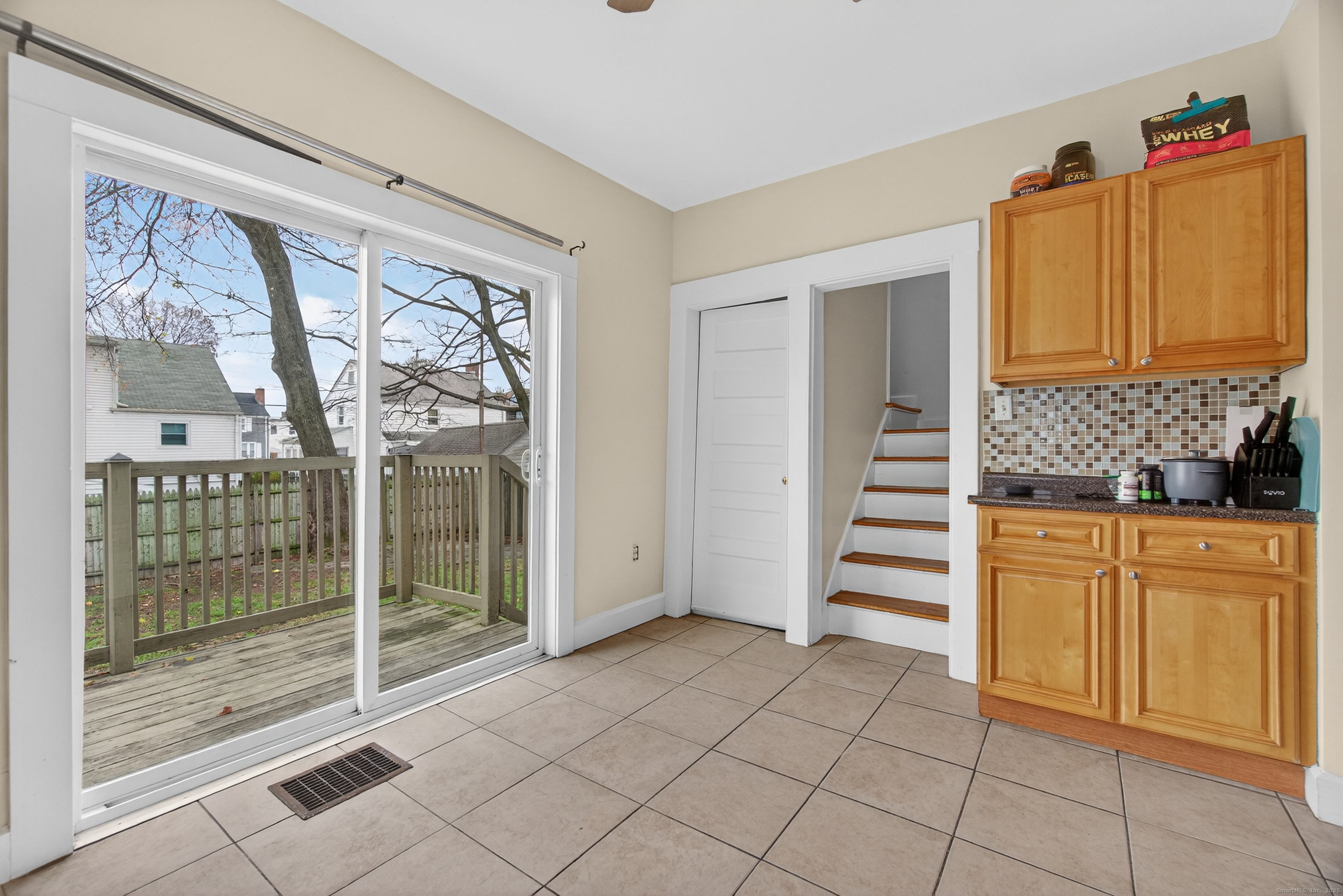 215 Overland Avenue Bridgeport, CT 06606 - Photo 11 of 32 a spacious bathroom with a mirror a bathtub and a shower