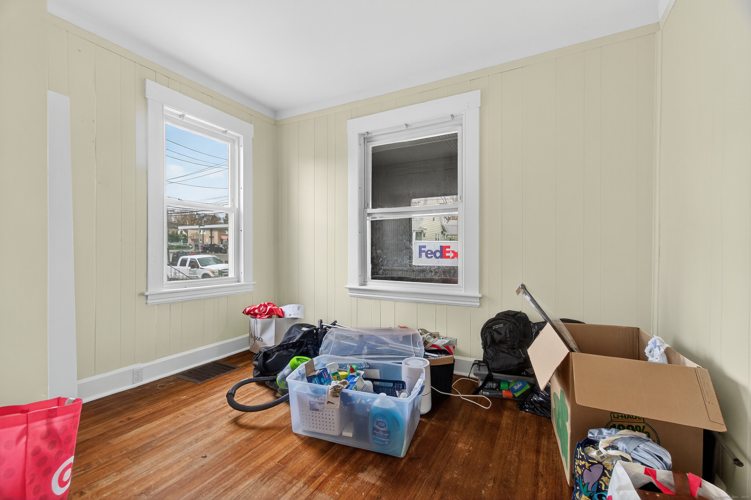 215 Overland Avenue Bridgeport, CT 06606 - Photo 16 of 32 a living room with furniture and wooden floor