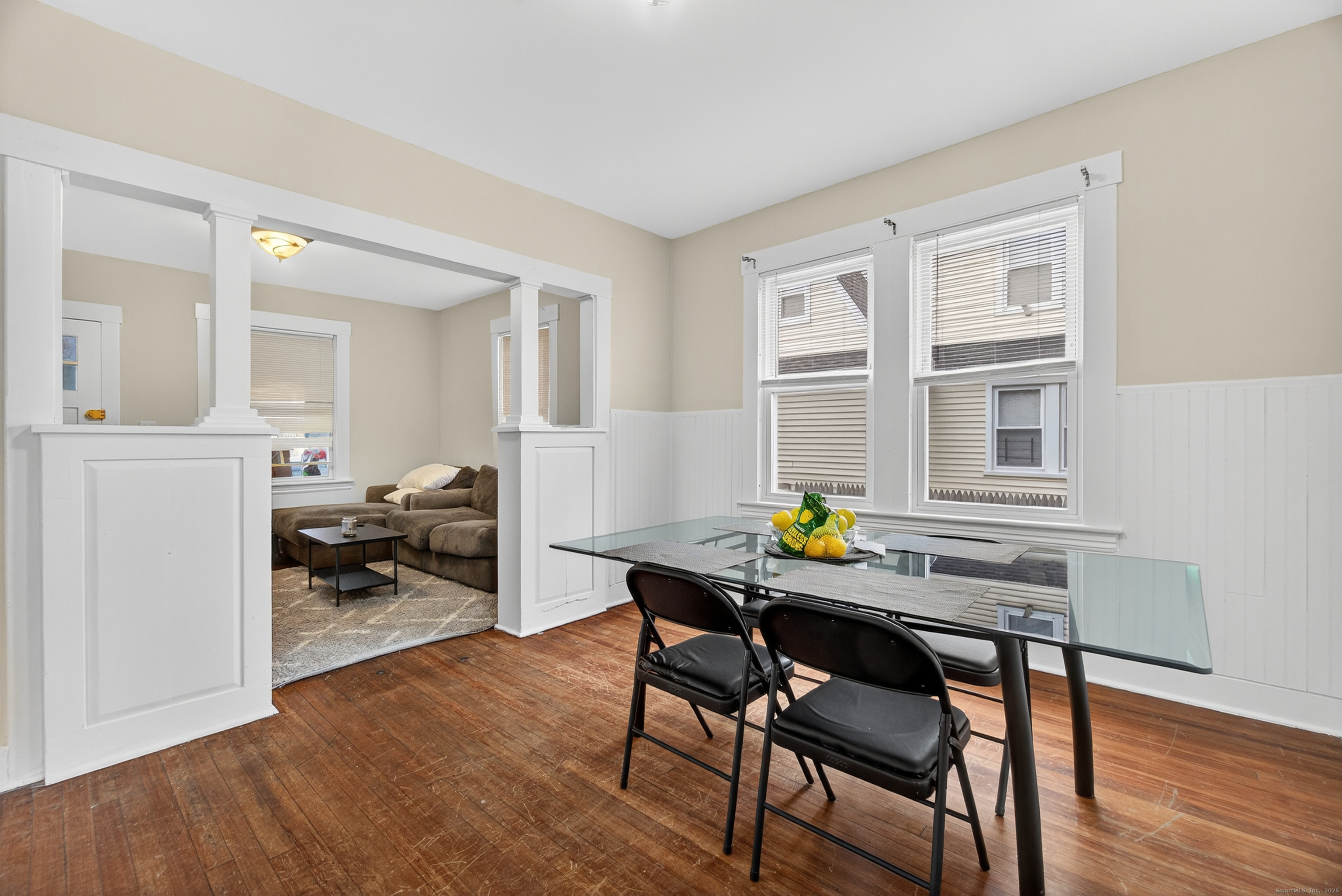 215 Overland Avenue Bridgeport, CT 06606 - Photo 7 of 32 a view of a dining room with furniture and chandelier