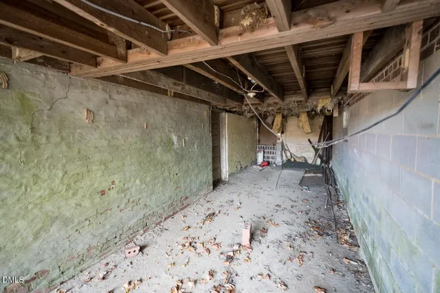a view of a house with a yard and tree s