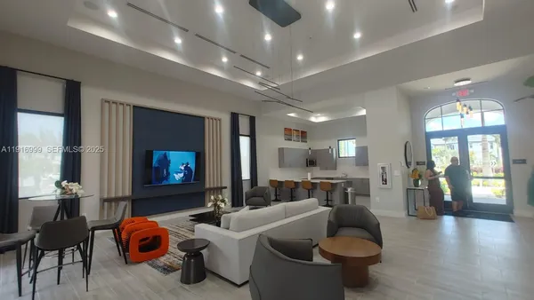 a kitchen with a sink appliances and cabinets