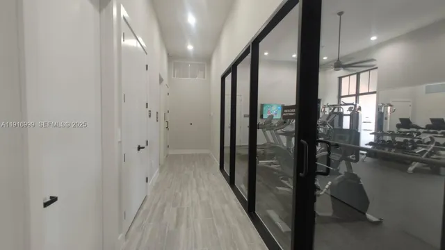 a kitchen with stainless steel appliances a stove and cabinets