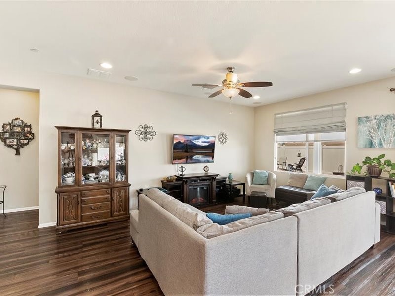 1580 Williamson Park Beaumont, CA 92223 - Photo 14 of 48 a living room with furniture and a wooden floor