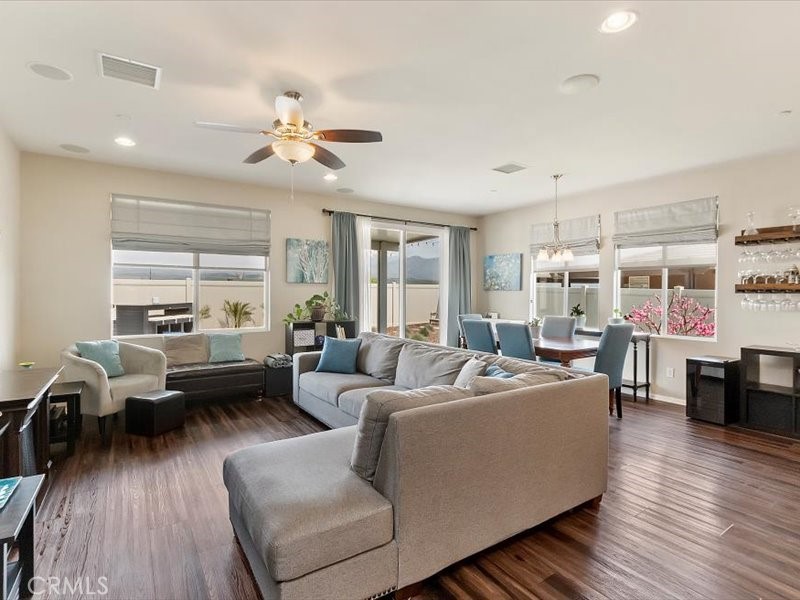 1580 Williamson Park Beaumont, CA 92223 - Photo 15 of 48 a living room with furniture and wooden floor
