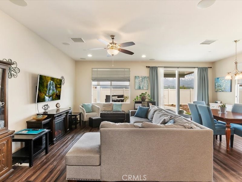 1580 Williamson Park Beaumont, CA 92223 - Photo 16 of 48 a living room with furniture kitchen view and a large window