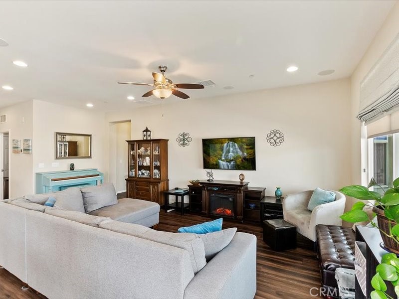 1580 Williamson Park Beaumont, CA 92223 - Photo 17 of 48 a living room with furniture and a flat screen tv