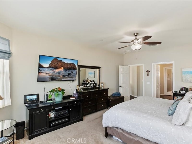 1580 Williamson Park Beaumont, CA 92223 - Photo 24 of 48 a bedroom with a bed and a dresser