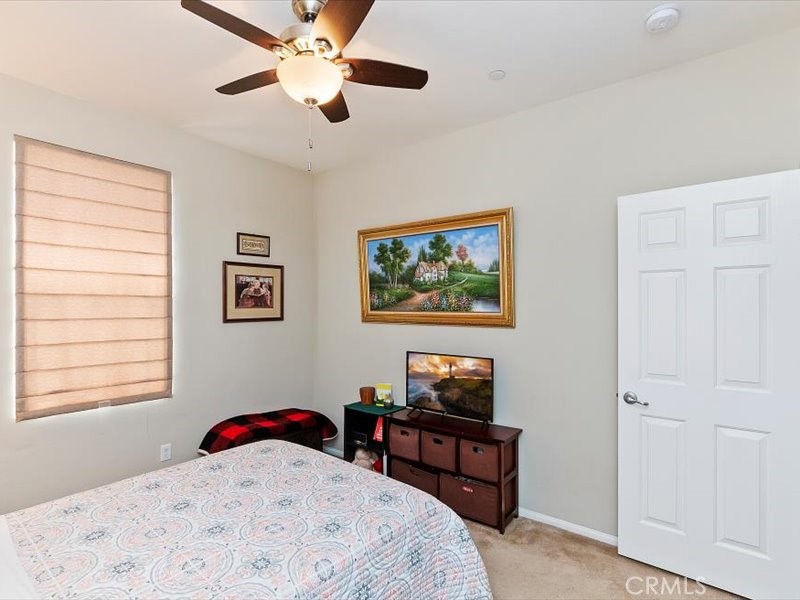 1580 Williamson Park Beaumont, CA 92223 - Photo 30 of 48 a bedroom with furniture and a window