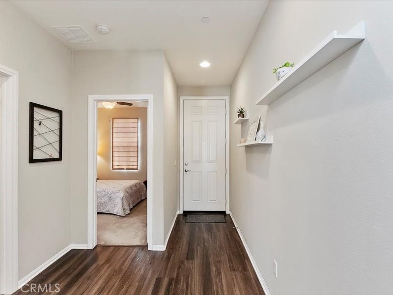 1580 Williamson Park Beaumont, CA 92223 - Photo 4 of 48 a view of livingroom with hardwood floor and hallway