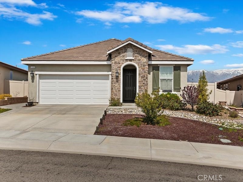 1580 Williamson Park Beaumont, CA 92223 - Photo 44 of 48 a front view of a house with garden