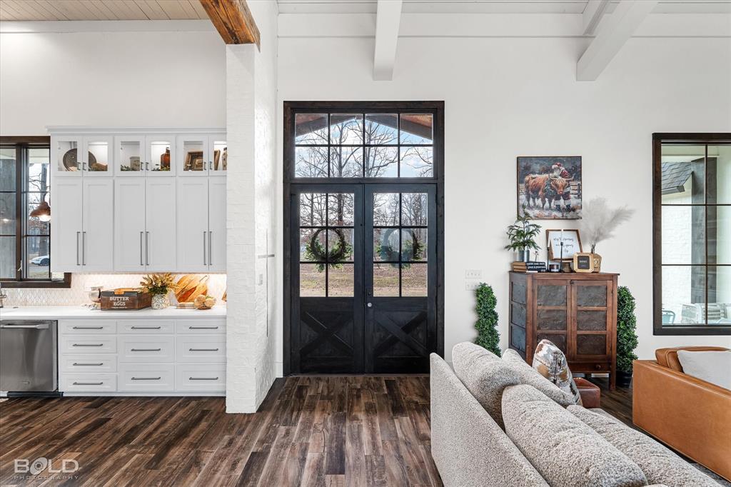5296 Linton Cutoff Road Benton, LA 71006 - Photo 15 of 40 Entryway featuring dark wood finished floors, beamed ceiling, and french doors