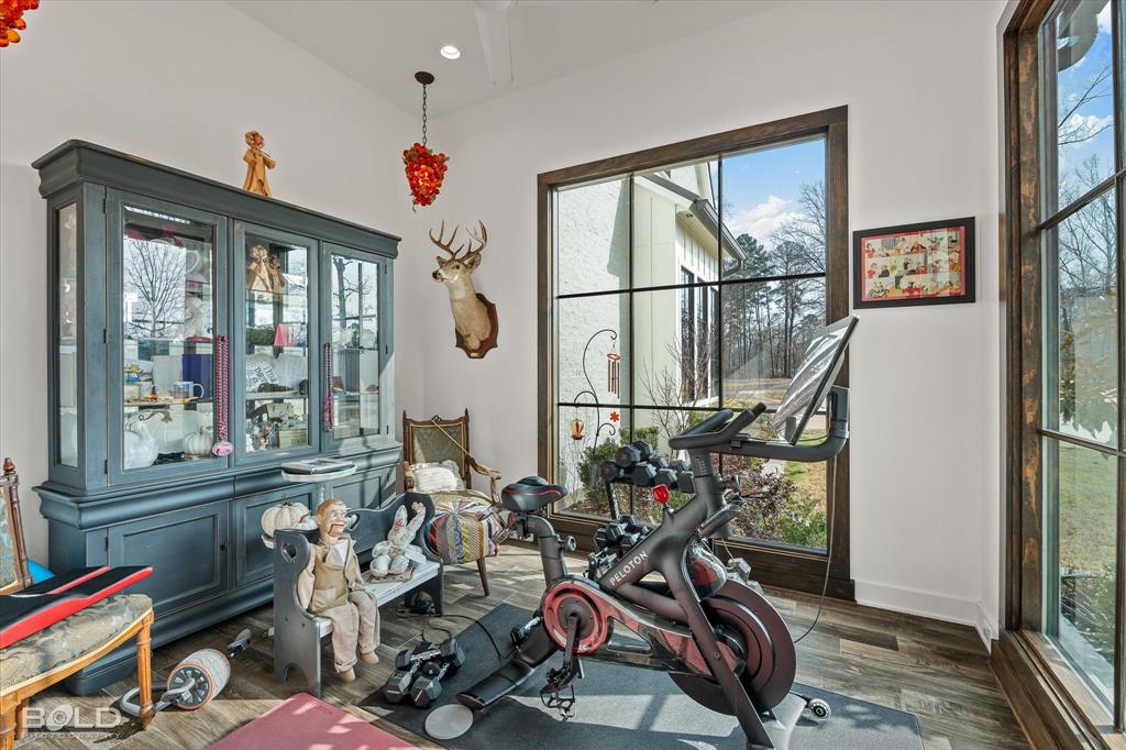 5296 Linton Cutoff Road Benton, LA 71006 - Photo 24 of 40 Workout area featuring dark wood-type flooring and recessed lighting