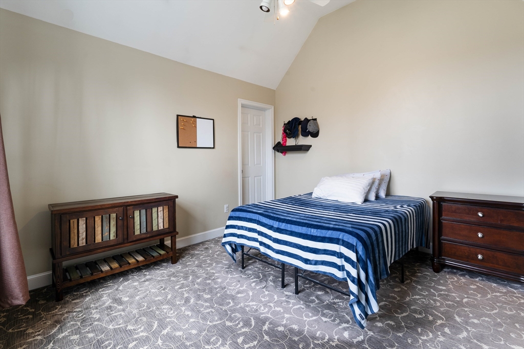 11 Pope Road Atkinson, NH 03811 - Photo 29 of 42 a bedroom with a bed and dresser