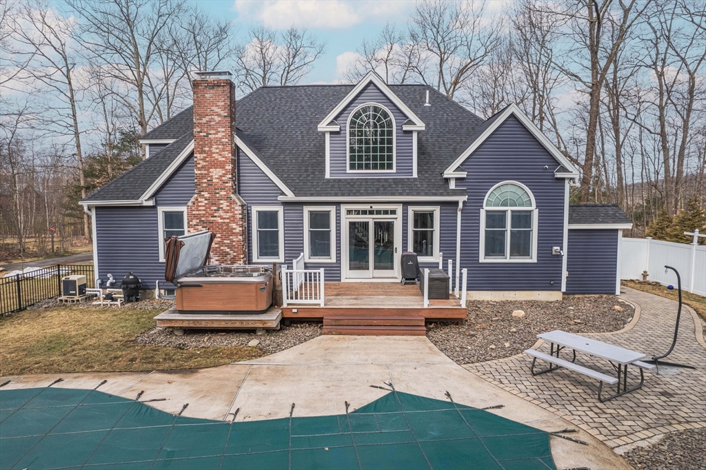 11 Pope Road Atkinson, NH 03811 - Photo 3 of 42 a front view of a house with garden