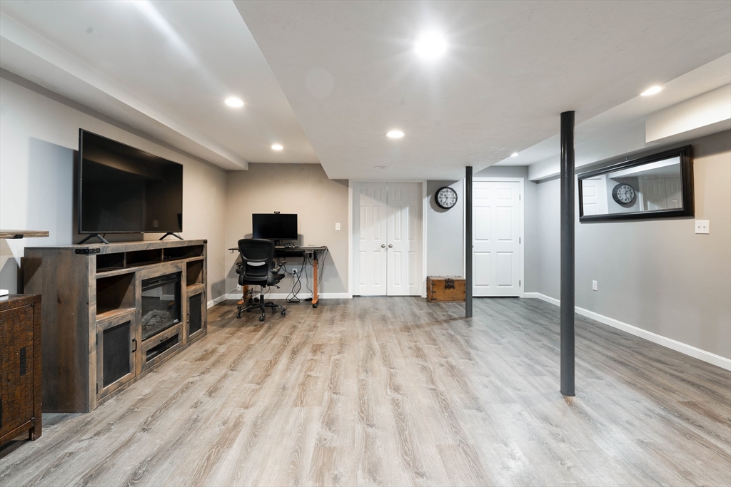 11 Pope Road Atkinson, NH 03811 - Photo 37 of 42 a view of a livingroom with furniture and wooden floor