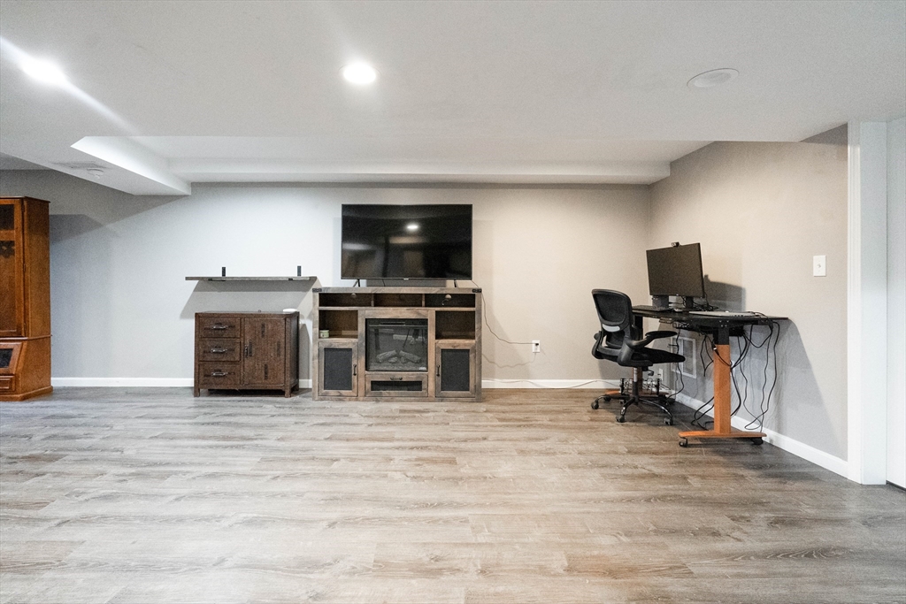 11 Pope Road Atkinson, NH 03811 - Photo 38 of 42 a view of a kitchen with a sink microwave and furniture