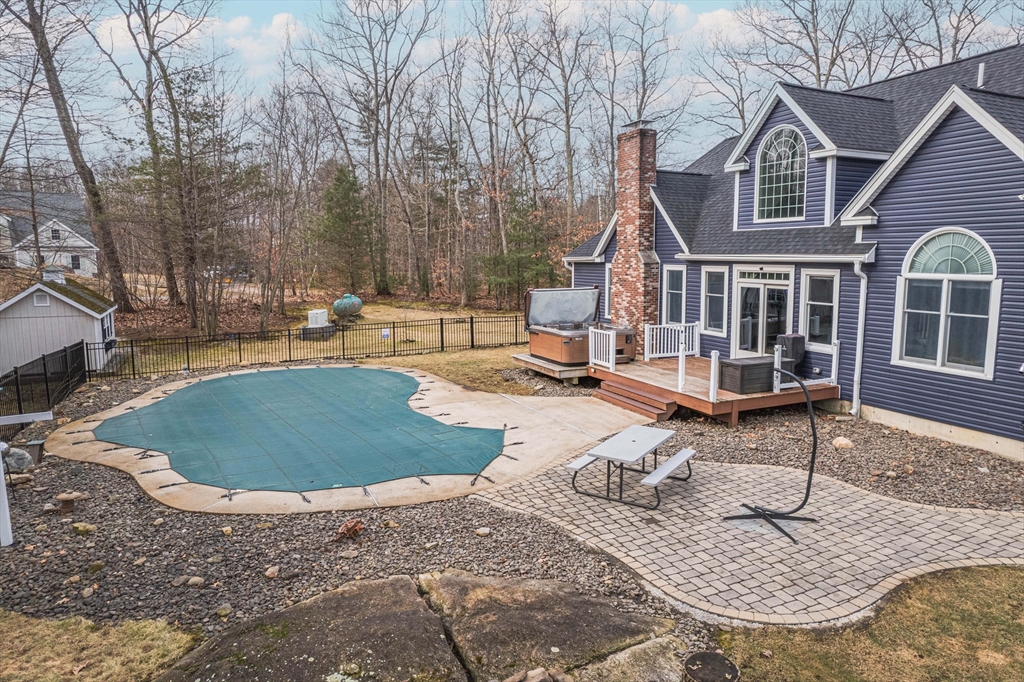 11 Pope Road Atkinson, NH 03811 - Photo 4 of 42 a view of a house with backyard