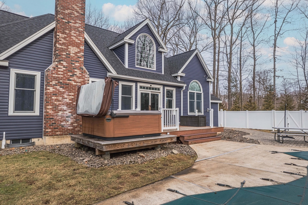 11 Pope Road Atkinson, NH 03811 - Photo 6 of 42 a view of a house with a yard