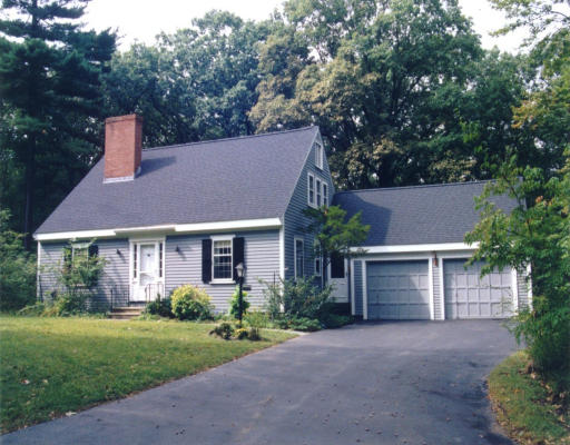 10 Barton Road Harvard, MA 01451 - Photo 1 of 1 a house that has a tree in front of it