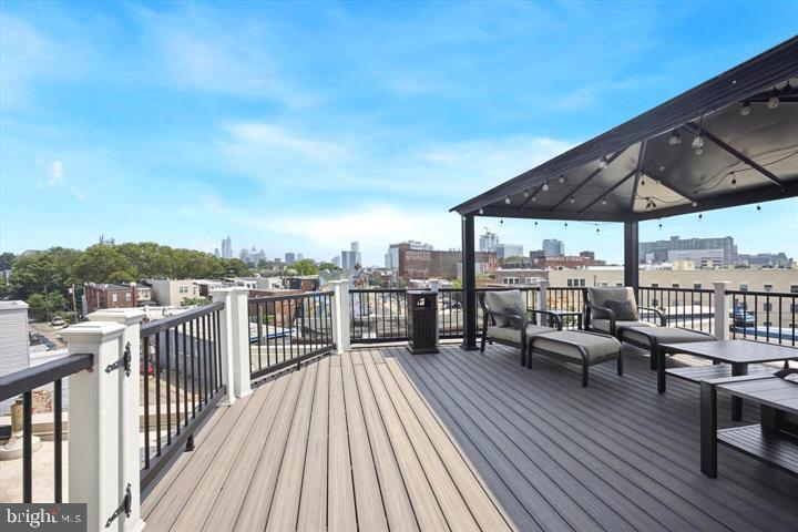 3933 Lancaster Avenue, Unit A Philadelphia, PA 19104 - Photo 18 of 22 an outdoor view of a balcony with seating space