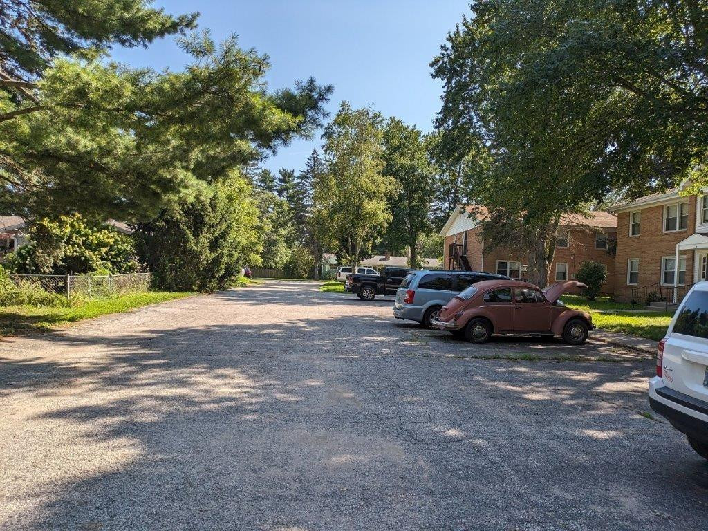 812 West Daumer Road, Unit C3 Kouts, IN 46347 - Photo 14 of 16 a view of cars parked in a parking lot