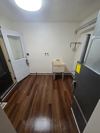 a view of small space with wooden floor