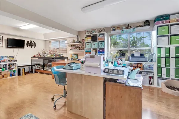 a kitchen with a table and chairs in it