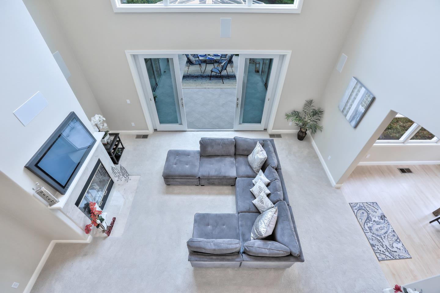 135 Cypress Point Road Half Moon Bay, CA 94019 - Photo 43 of 80 a living room with furniture and a potted plant