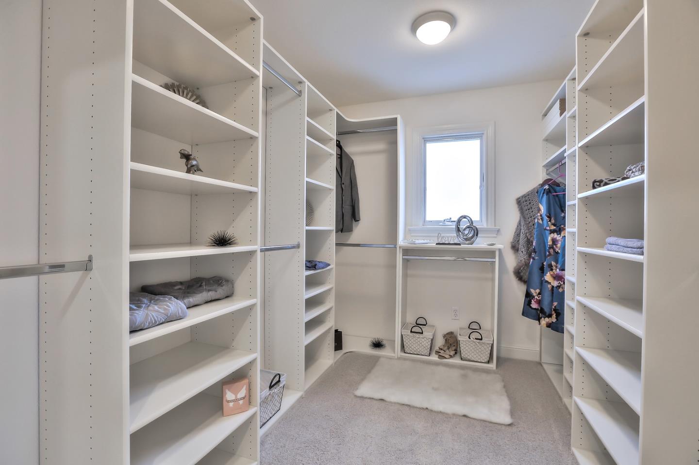 135 Cypress Point Road Half Moon Bay, CA 94019 - Photo 50 of 80 a view of walk in closet with empty racks