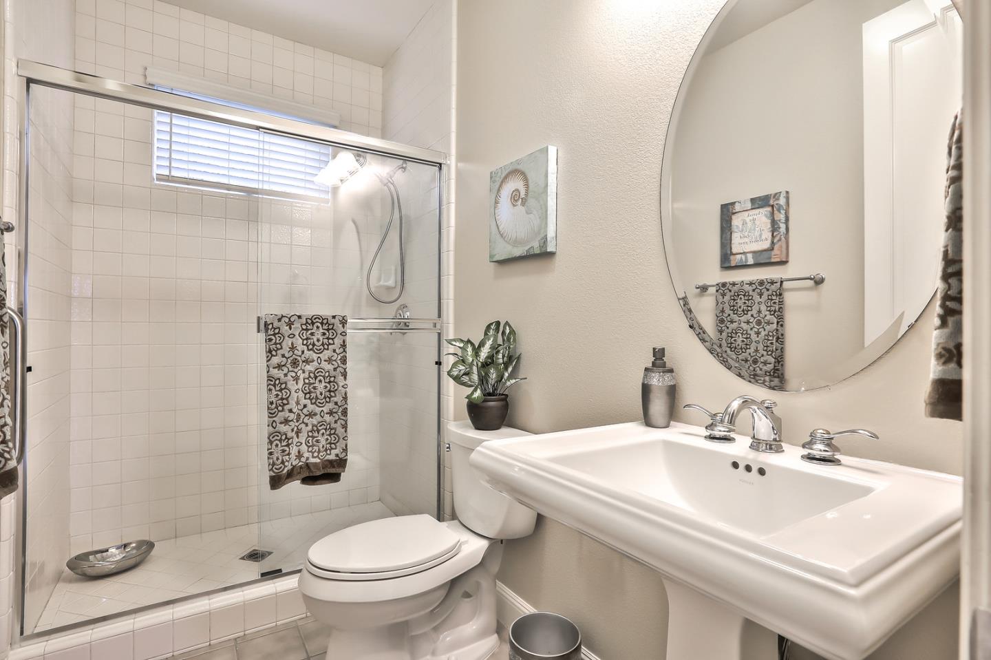 135 Cypress Point Road Half Moon Bay, CA 94019 - Photo 64 of 80 a bathroom with a sink toilet and shower