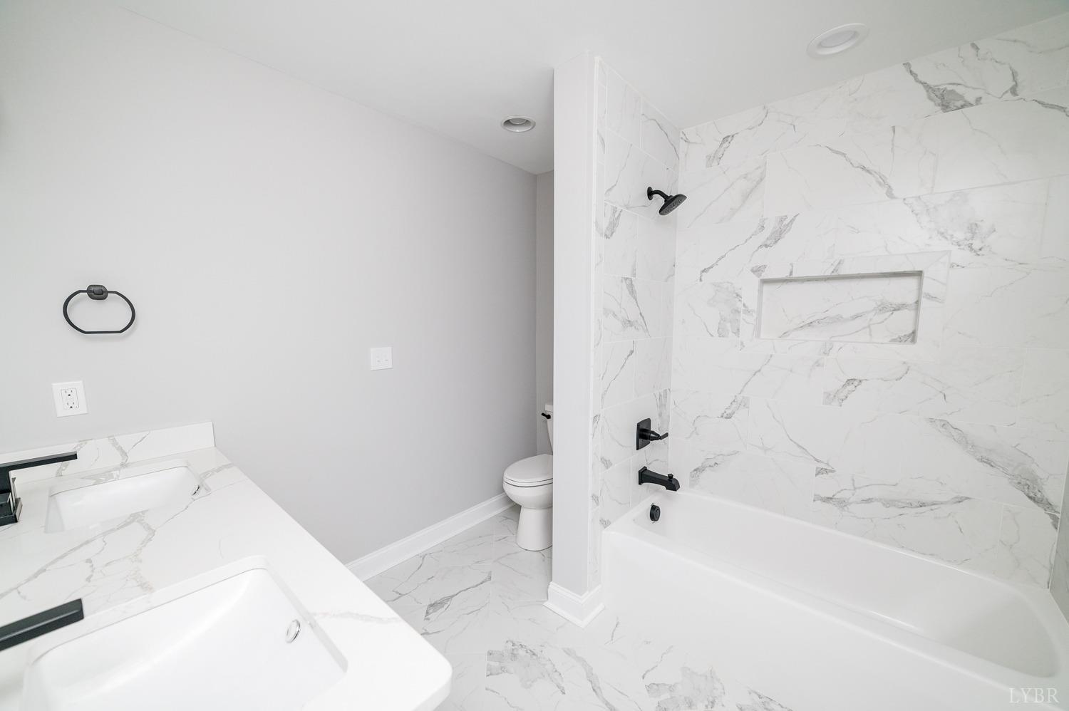 1073 South Westyn Loop Forest, VA 24551 - Photo 27 of 66 a bathroom with a white tub