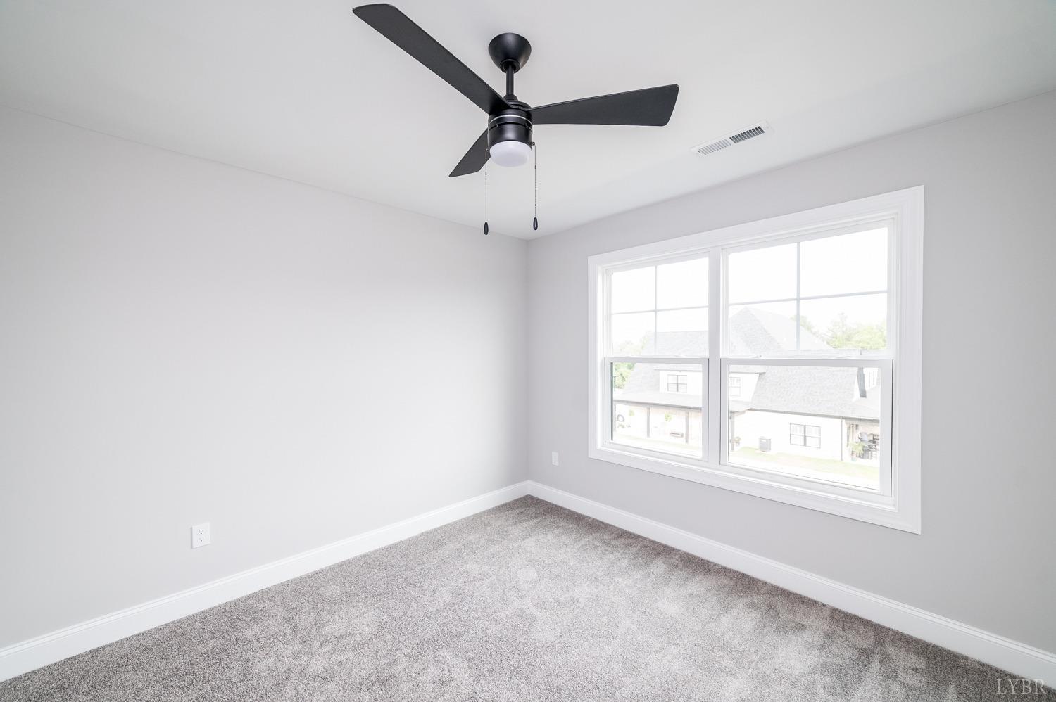 1073 South Westyn Loop Forest, VA 24551 - Photo 31 of 66 an empty room with a window