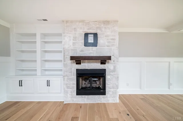 a view of a kitchen with a sink and a window
