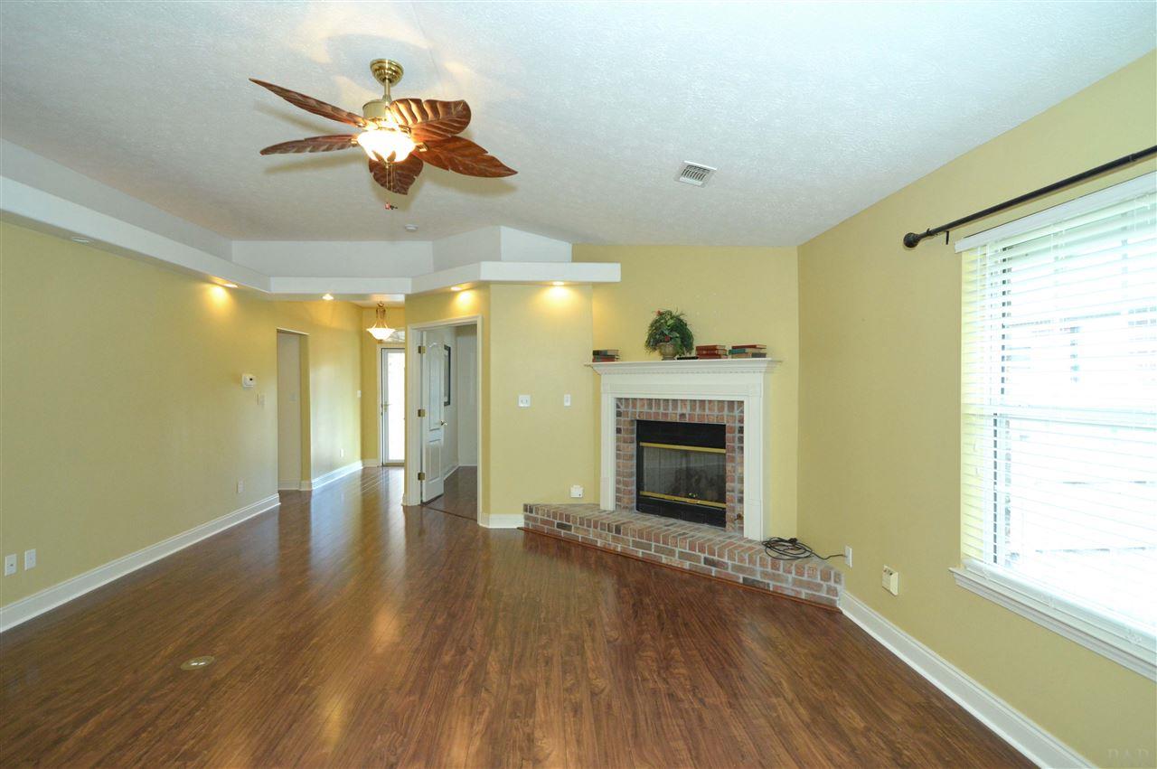 3550 Haley Way Pace, FL 32571 - Photo 8 of 33 Double doors to left of fireplace is flex room