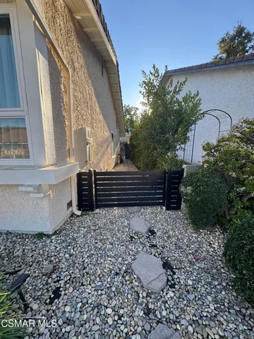 a house view with a backyard space
