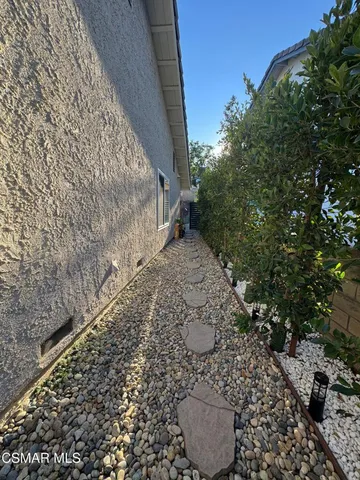 a view of a back yard of the house