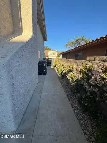a view of a back yard of the house