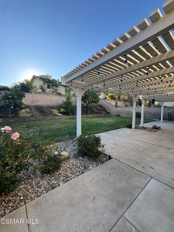 a view of a porch with a yard