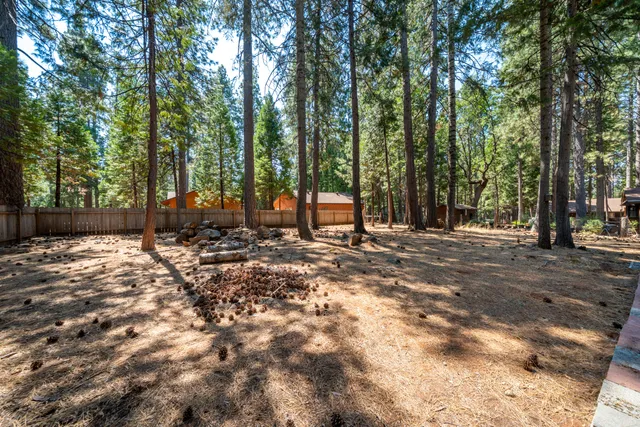 a view of a backyard of a house
