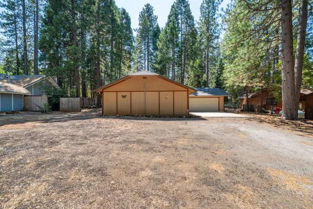 a house with trees in front of it