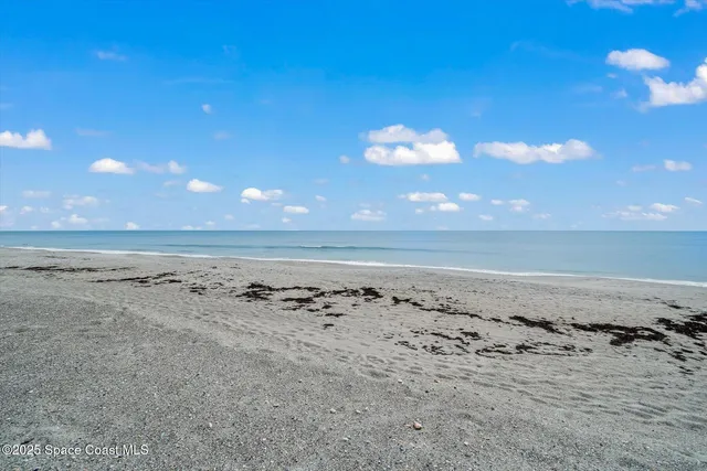 a view of ocean and beach