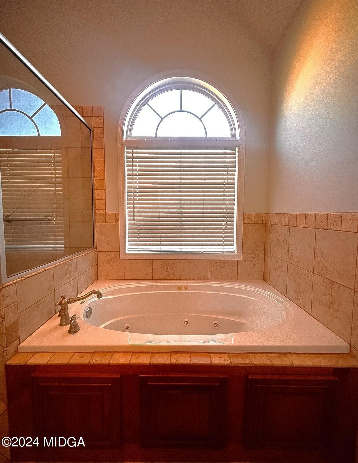 208 Pembroke Centerville, GA 31028 - Photo 22 of 30 a bathroom with a sink and a window