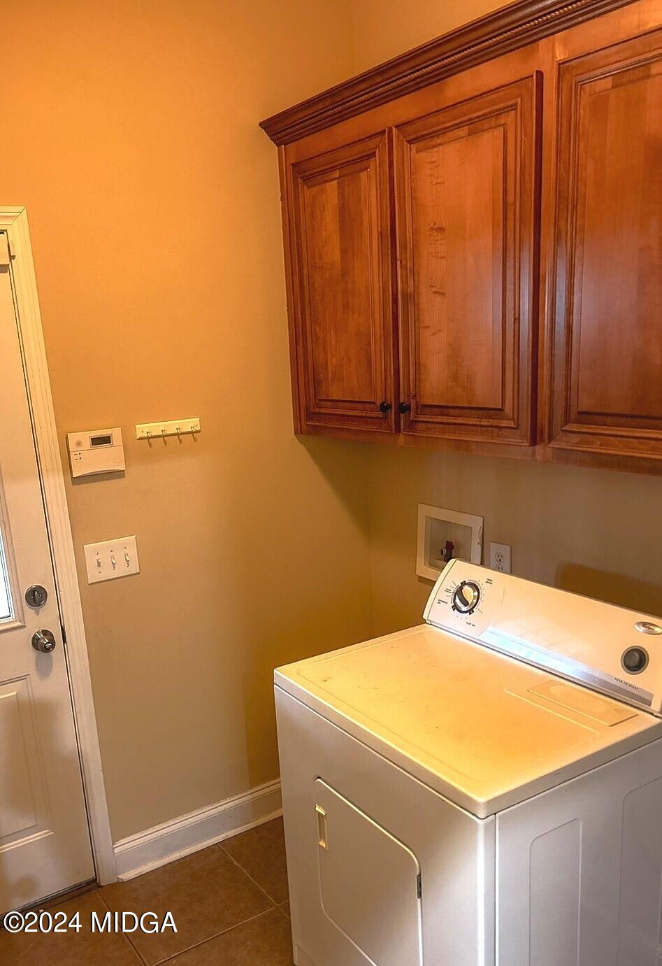 208 Pembroke Centerville, GA 31028 - Photo 25 of 30 a utility room with dryer and washer