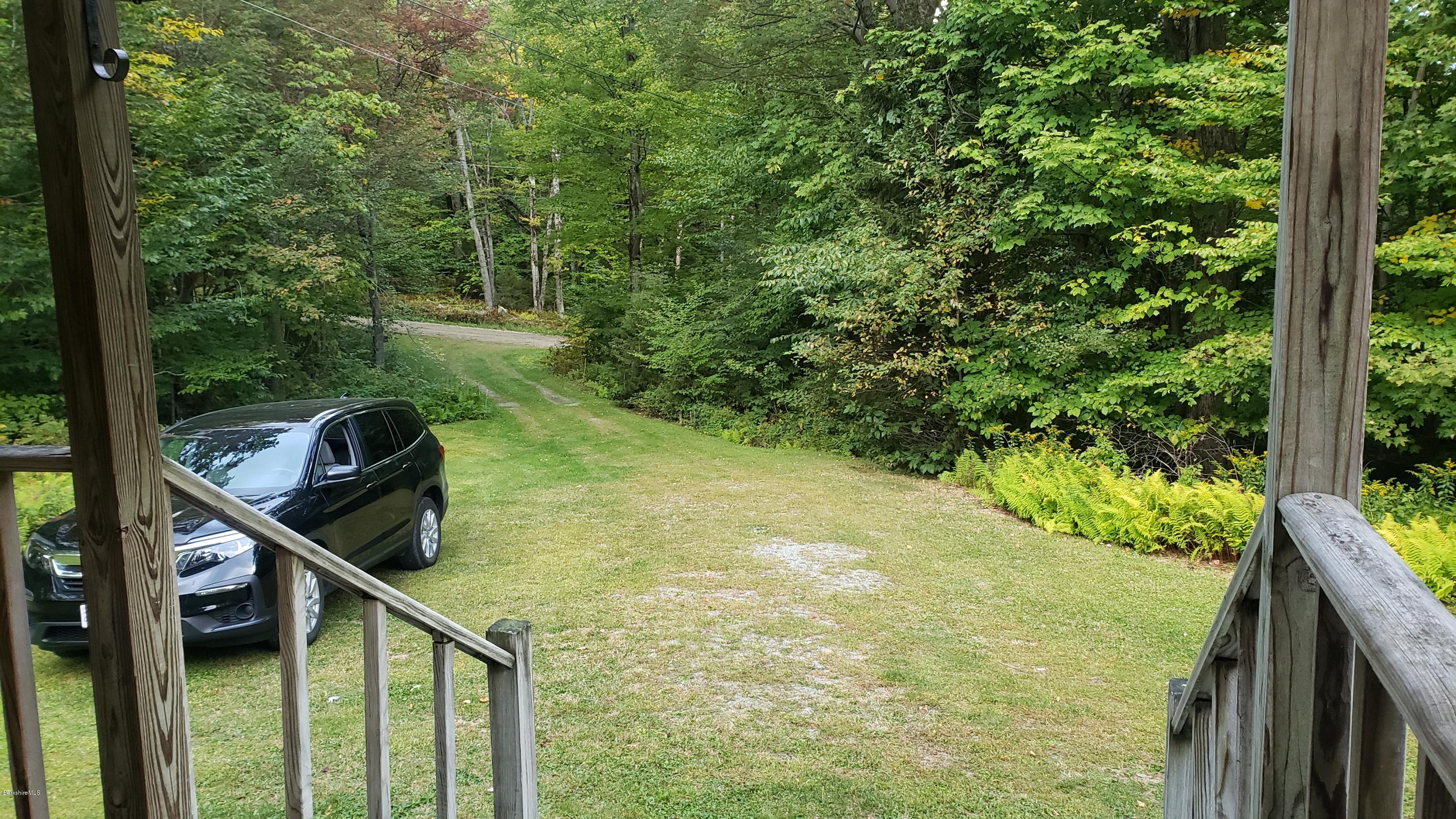 1507 County Road Stamford, VT 05352 - Photo 18 of 20 front porch down to road