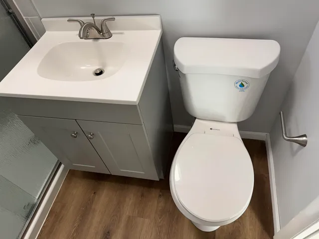 a bathroom with a sink and toilet