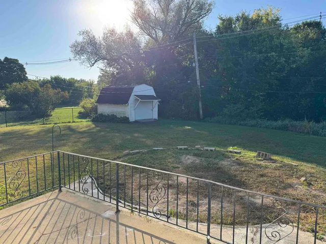 a view of a balcony with an outdoor space