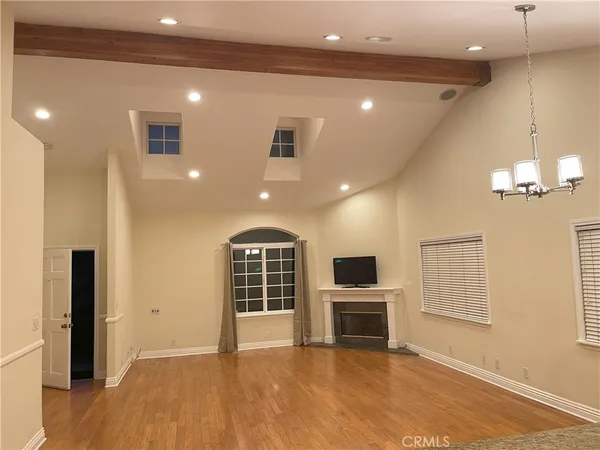 a view of kitchen with microwave and furniture